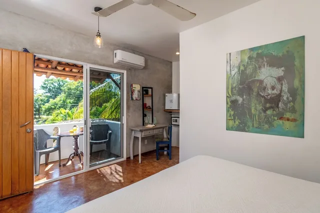 غرفة قياسية بسرير كينج بشرفة، Villa Mozart y Macondo 4/5