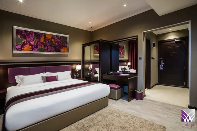 جناح تنفيذي بسرير كينج وسريرين منفصلين بغرفتي نوم، فندق نورماس(Normas Hotel) 4/8