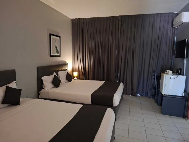 غرفة كومفورت رباعية بسريرين كوين، Al Baraka Hotel 5/6