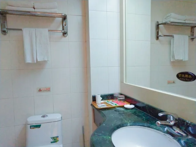 غرفة بسرير كوين بإطلالة على المدينة، Dalian Venus Apartment 1/1
