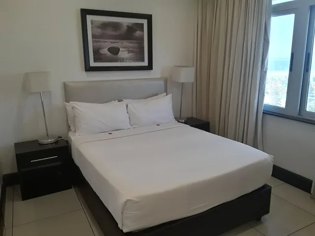 4 Rooms, Family, Double and Twin Beds, Partial Ocean View، Parade Hotel 1/2