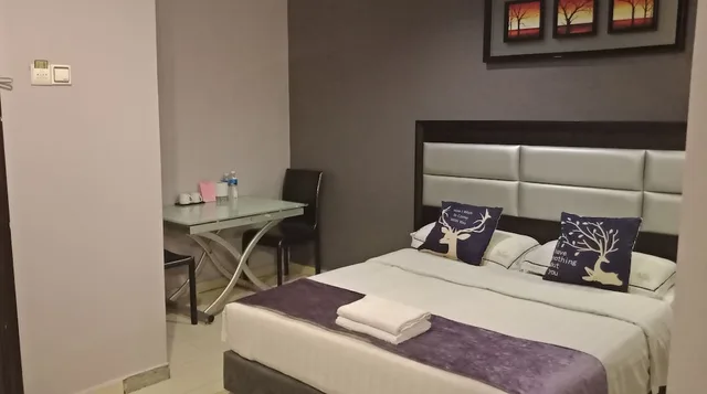غرفة بريميير ديلوكس عائلية بسرير كوين وسريرين منفصلين، T Hotel 2/2