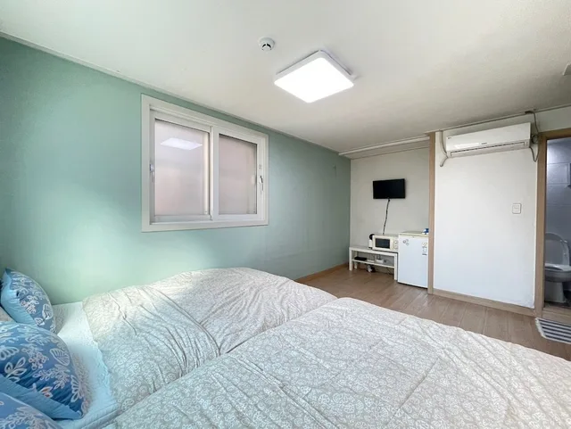 غرفة أساسية رباعية بسريرين مزدوجين، Twin Rabbit Guesthouse 3/4