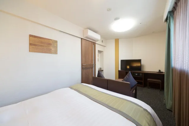 غرفة بسرير كينج وسرير كوين، Myojin no Yu Dormy Inn Premium Kanda 1/10