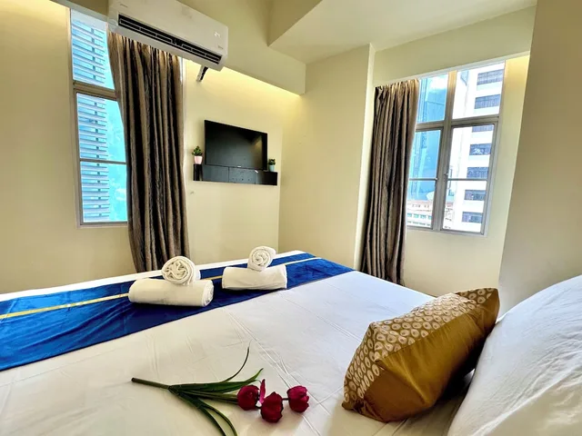 غرفة ديلوكس بسرير كينج بإطلالة على المدينة، Central City Hotel at Chinatown 2/4