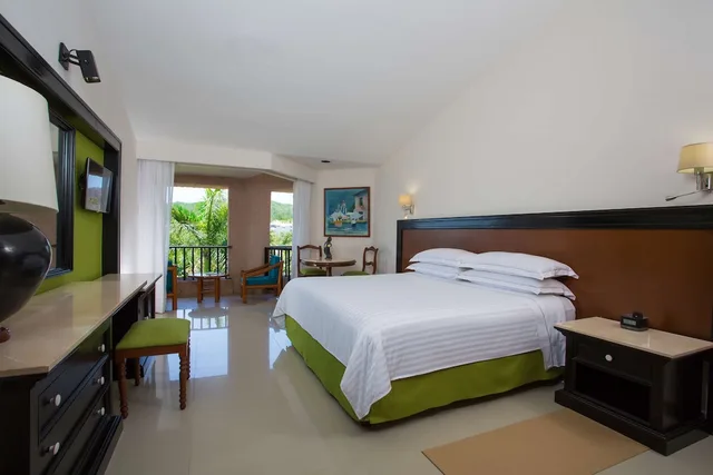 غرفة ديلوكس بسرير كينج بإطلالة على الحديقة، Barcelo Huatulco - All Inclusive 5/8
