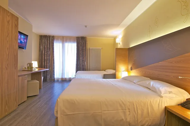 Suite, King Bed, Sofa, Harmony Suite Hotel 2/5