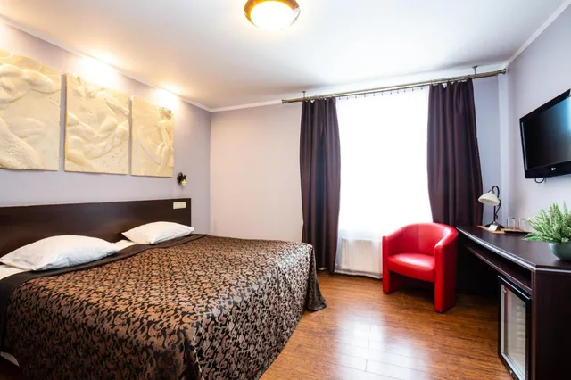 غرفة بسرير كوين، Primo Hotel 1/6