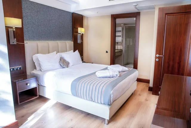 جناح بسريرين منفصلين بغرفة نوم واحدة مع أريكة، Grand Aras Hotel Suites Istanbul Sisli 2/2