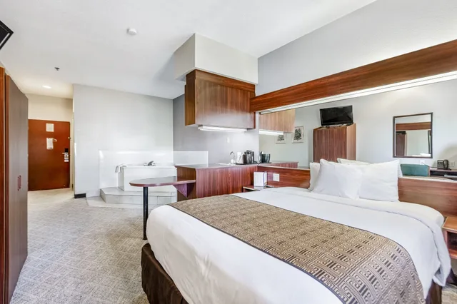 جناح جونيور بسرير كوين، Trident Inn And Suites 1/2