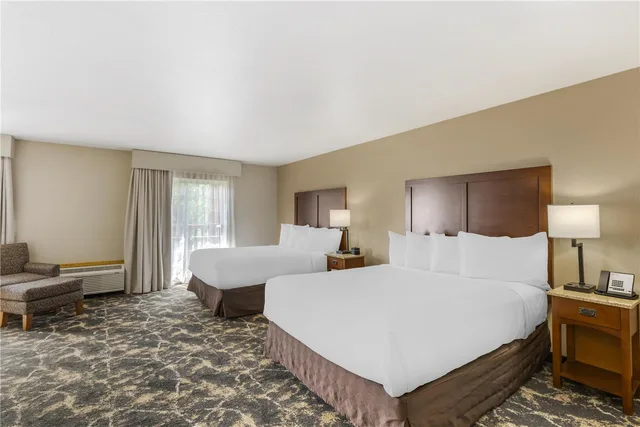 Room, 2 Queen Beds, River View, Balcony, Kitchenette, Best Western Plus Riverfront Hotel And Suites 1/2