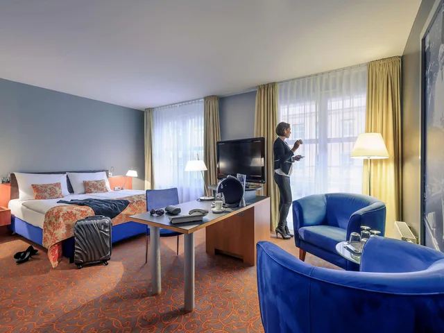 جناح عائلي بغرفتي نوم مع أريكة، Mercure Hotel & Residenz Checkpoint Charli 3/5