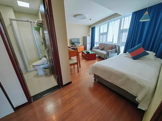 جناح عائلي بسرير كينج وسرير فردي، East King Business Hotel 4/9