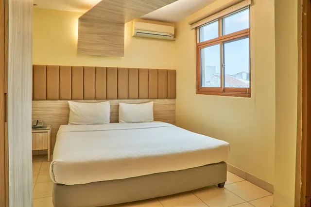 غرفة قياسية بسرير كوين، Hotel Alia Boutique Pasar Baru 1/3