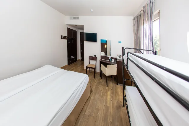 غرفة قياسية رباعية بسريرين منفصلين، Hotel Bonotto 1/7