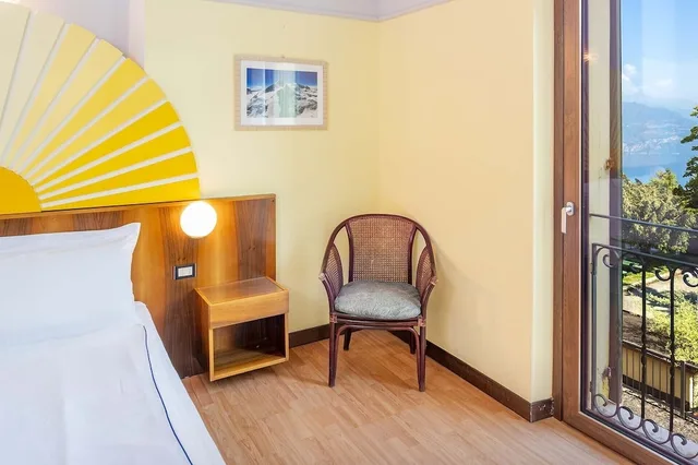 غرفة بسريرين منفصلين بإطلالة على البحيرة، Park Hotel Jolanda 2/6