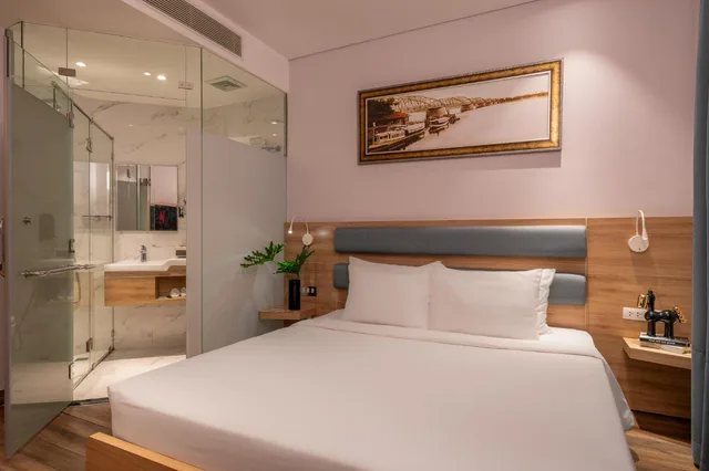 Deluxe, Queen Bed, No Window، Adora Mira Hotel (formerly Ramada Encore By Wyndham Saigon D1) 2/9