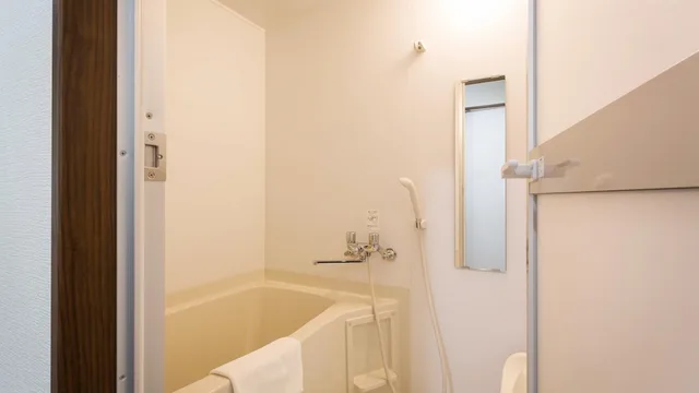 غرفة قياسية بسريرين منفصلين، Kariyushi Condominium Resort Naha Ryujin Hotel Ukishima 4/4