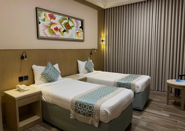 غرفة بسريرين منفصلين، فندق عفراء(Afraa Hotel) 4/7