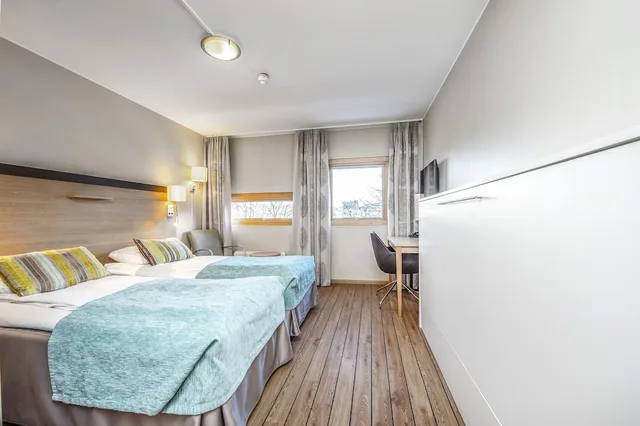 غرفة بفراش فوتون وسريرين منفصلين مع سرير إضافي، Anker Hotel 3/4