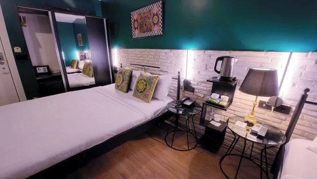 غرفة قياسية رباعية بسريرين كوين، Think Hotel 2/9
