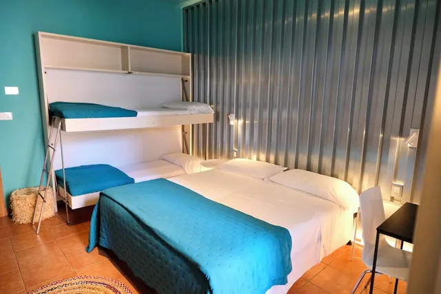 غرفة اقتصادية رباعية بسرير مزدوج وسرير بطابقين بشرفة، HOTEL PORTOFINO 3/9