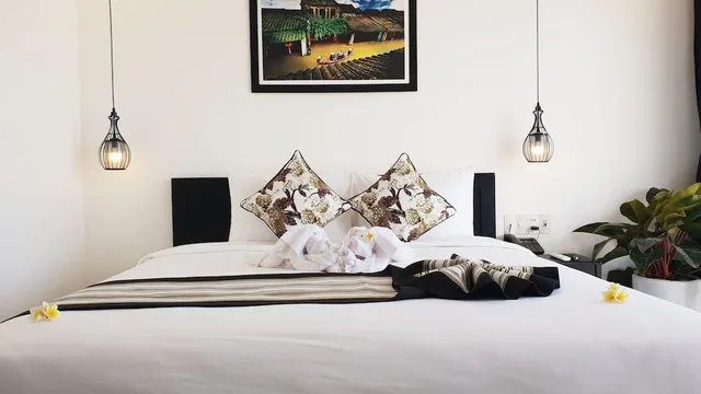 غرفة سوبيريور ركنية بسرير كينج بإطلالة على المدينة، Gem Riverside Hotel Hoi An 2/2