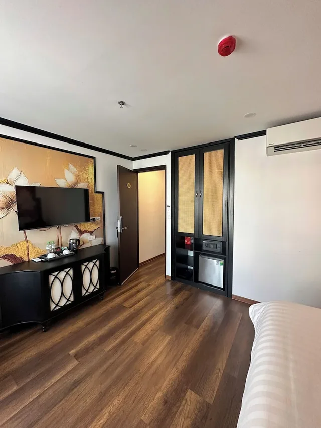 غرفة ديلوكس رباعية بسرير كينج وسريرين منفصلين، Aquarius Premium Hotel 5/7