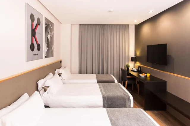 غرفة ثلاثية بسرير كينج مع أريكة، Hotel Kramer 1/8