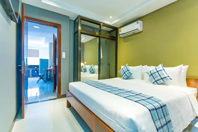 جناح عائلي بسريرين منفصلين بشرفة، Botum Palace Hotel 1/1
