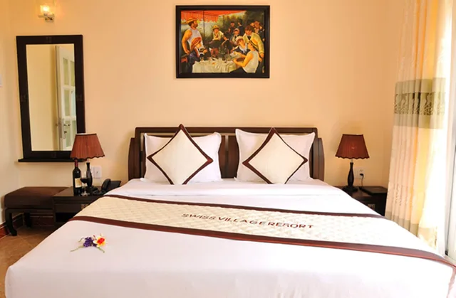 غرفة عائلية بسرير كوين وسريرين منفصلين بإطلالة على الحديقة، Le Aqua Resort & Spa Phan Thiet 3/7