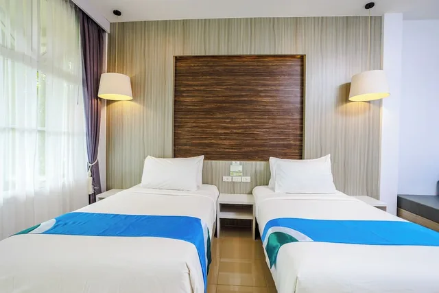 غرفة ديلوكس بسريرين منفصلين بشرفة بغرفة نوم واحدة مع أريكة، Ao Nang Baan Suan Resort 3/5