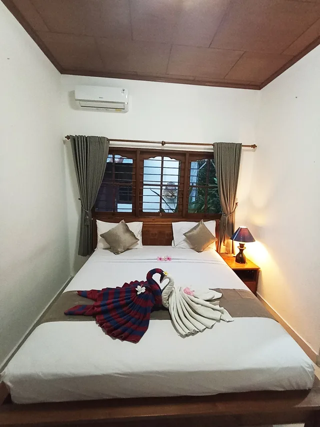 غرفة عائلية بسريرين كوين مع أريكة، Kusnadi Hotel 2/6