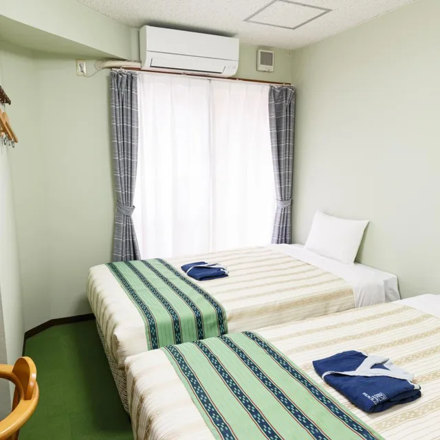 غرفة بسريرين منفصلين، Hotel Peaceland Kume 4/10
