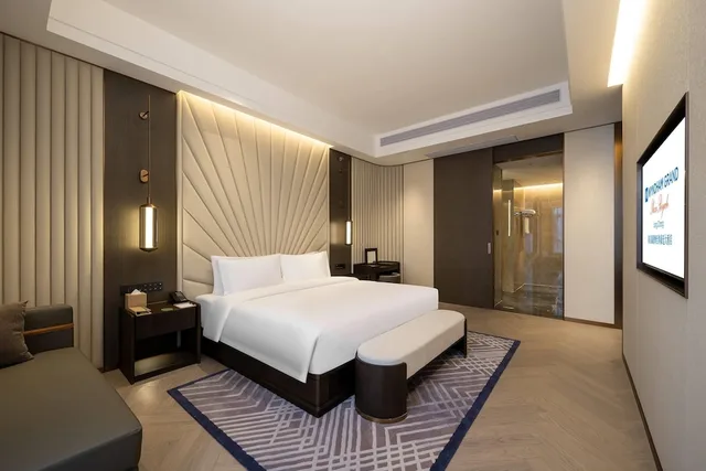 جناح ديلوكس بسرير كينج، Wyndham Grand Plaza Royale Longchang 1/2