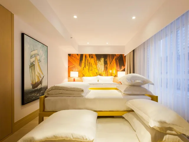 غرفة عائلية بسرير كوين مع أريكة، Caravel Hotel 1/1