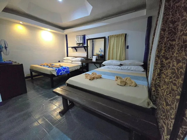 غرفة سوبيريور رباعية بسريرين مزدوجين بإطلالة على البحر بشرفة، Islandfront Cottages 4/10