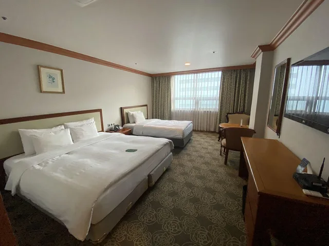 غرفة ديلوكس عائلية بثلاثة أسرّة، Hotel International 2/2