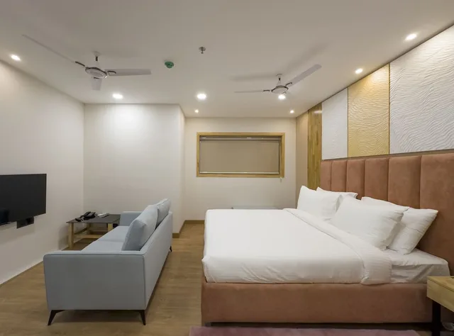 غرفة ديلوكس بسرير كينج وسرير كوين، The Habitat Suites 1/1