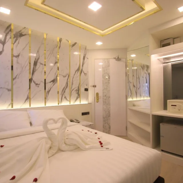 غرفة ديلوكس بسرير كينج وسرير كوين، Pratunam Atrium Hotel 9/10
