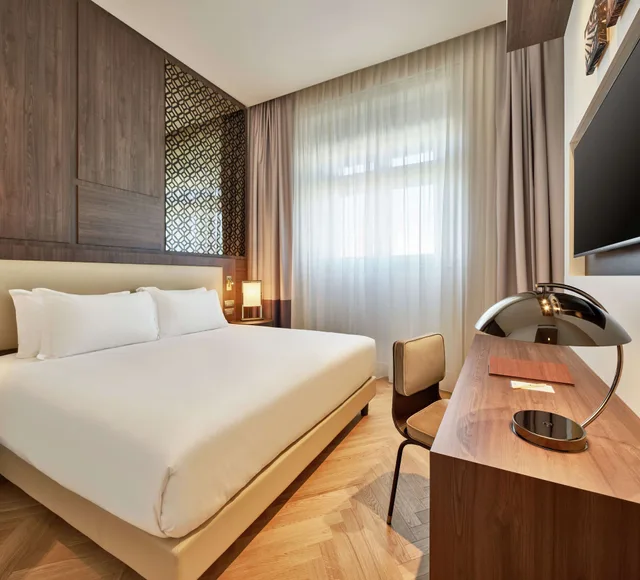 1 Bedroom, Historical, Suite, King Bed، Doubletree By Hilton Trieste 1/9