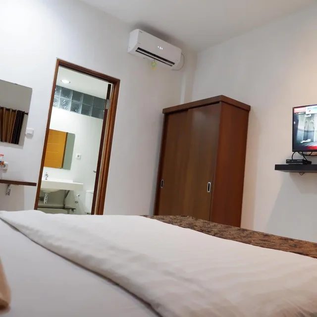غرفة ديلوكس بسرير مزدوج أو سريرين منفصلين، Hotel Netral Jombang 6/10