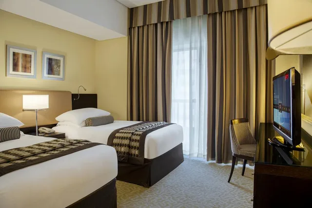 جناح بسرير كينج بغرفة نوم واحدة، TIME Oak Hotel and Suites 1/2
