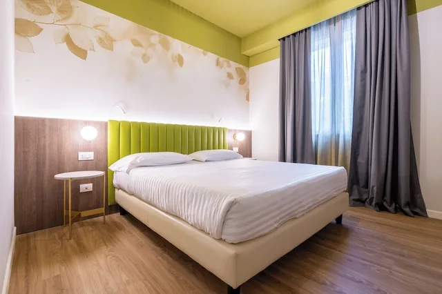 غرفة سوبيريور رباعية بسرير مزدوج مع أريكة، Hotel Regina Elena 57 &amp; Oro Bianco Spa 1/6