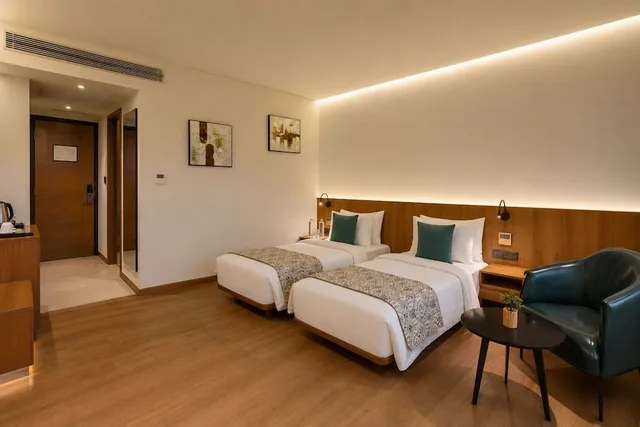 غرفة بريميوم بسريرين منفصلين للمدخنين، The Fern Residency Jamnagar 1/4