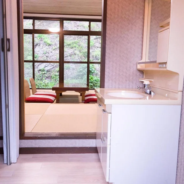 غرفة يابانية في الملحق، Hotel Caretta Amami 2/3