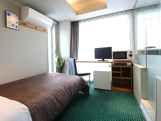 Standard, Single, Single Bed, Night View, Bathtub، Hotel Livemax BUDGET Yumoto 1/2