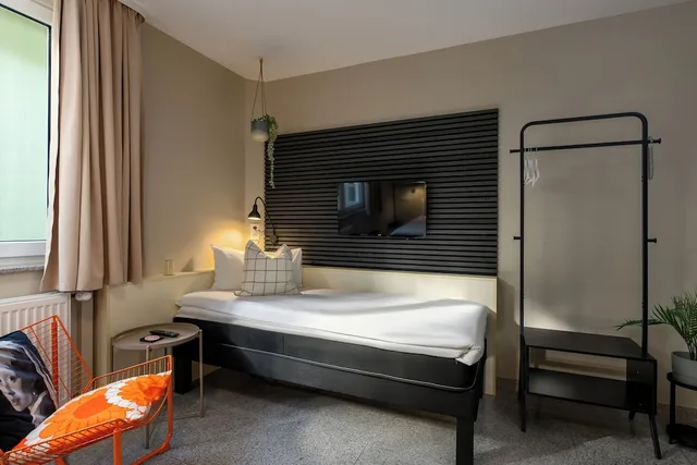 غرفة كومفورت ثلاثية بسرير كوين بإطلالة على المدينة، SleepinRoomz Boutique Hotel 1/5