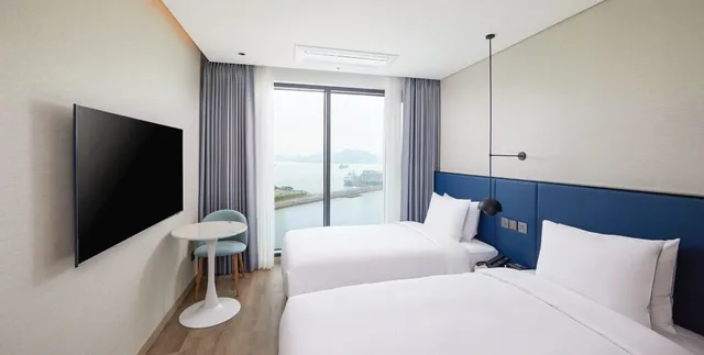 غرفة ديلوكس بسريرين منفصلين بإطلالة على البحر، Citadines Connect Hari Busan 1/3