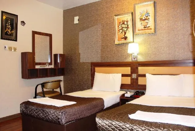 غرفة عائلية بسرير كينج وسرير فردي، Downtown Hotel Dubai 1/1